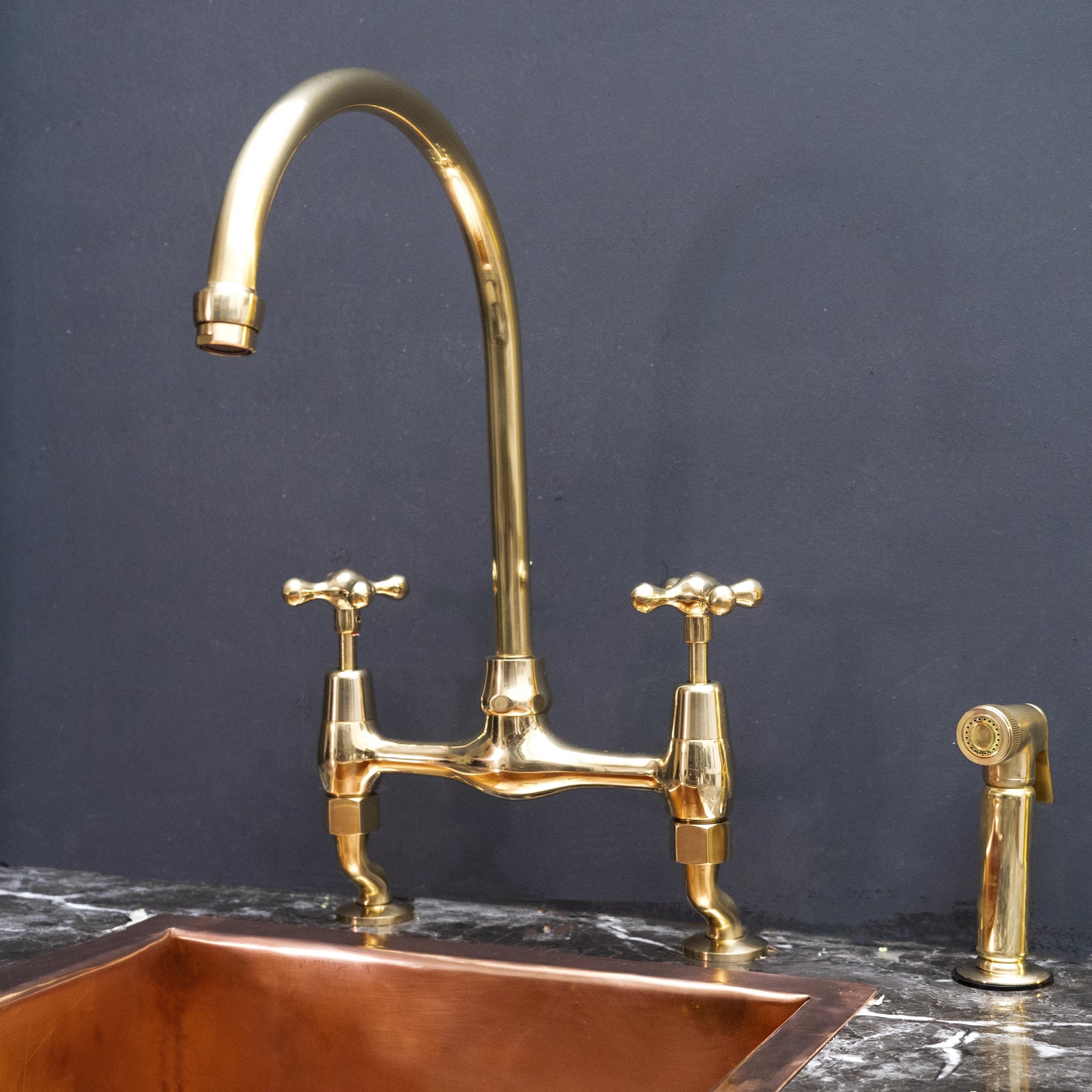 Old World Charm Kitchen Design featuring Unlacquered Brass Curved Legs Bridge Kitchen Faucet