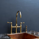 Unlacquered brass 3-hole bridge faucet – side view with natural patina