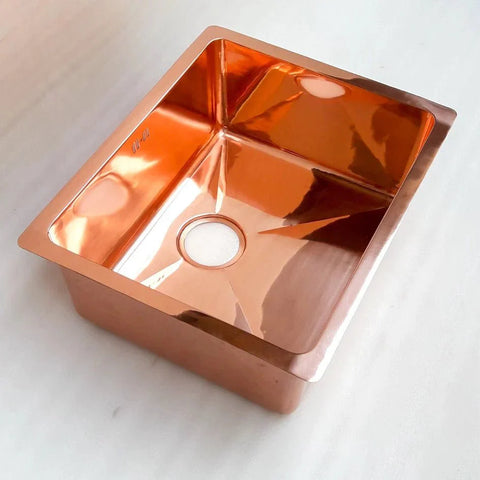 Smooth copper kitchen island sink – clean undermount profile, front view