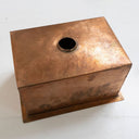 Hammered copper undermount sink – installed in countertop, top-down view