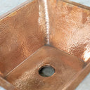 Handcrafted hammered copper sink – side profile showing undermount depth