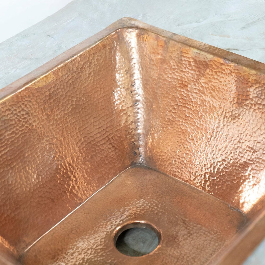 Handcrafted undermount hammered copper kitchen sink – artisan-made, front view