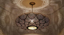 Handmade Moroccan scalloped brass ceiling lamp with warm amber lighting – Brass For Homes