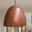 Close-up of hammered copper dome pendant rustic texture – farmhouse pendant light – Brass For Homes