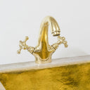 Polished brass bathroom vanity faucet – side view with traditional handle