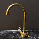 Unlacquered brass single hole gooseneck faucet – installed on vanity